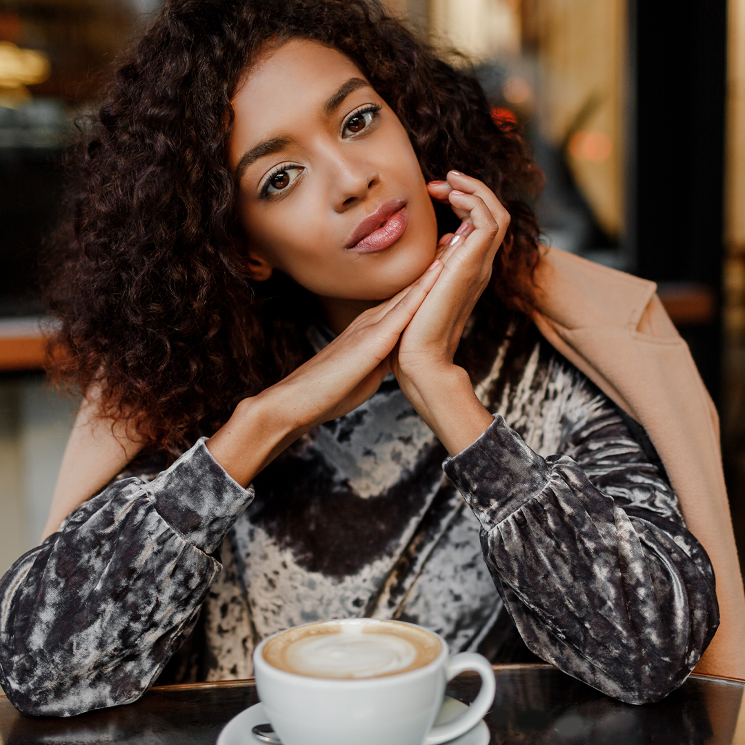 close-up-lifestyle-portrait-happy-carefree-black-woman-enjoying-coffee-break-paris